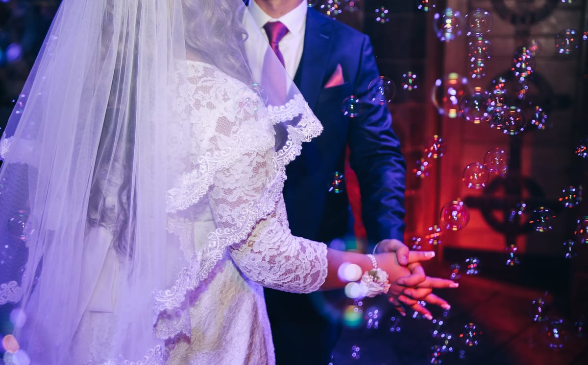 Hire bubble machine — bride and groom dancing in a shower of bubbles for parties and events in Johannesburg, Sandton and Randburg