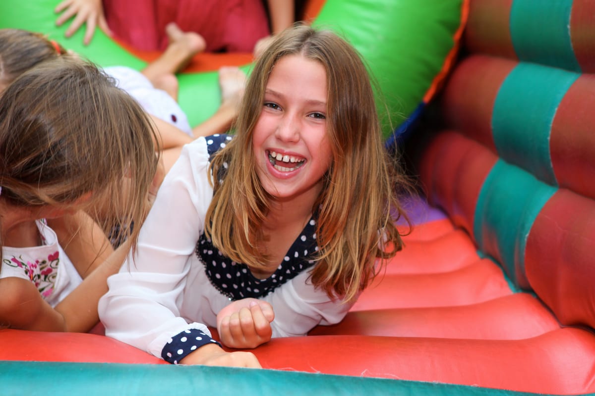 Jumping Castle hire — children playfully jumping on colorful bouncy cast | Panda Party Hire Hire jumping castle — children playfully jumping on colorful bouncy cast for parties and events in Johannesburg, Sandton and Randburg