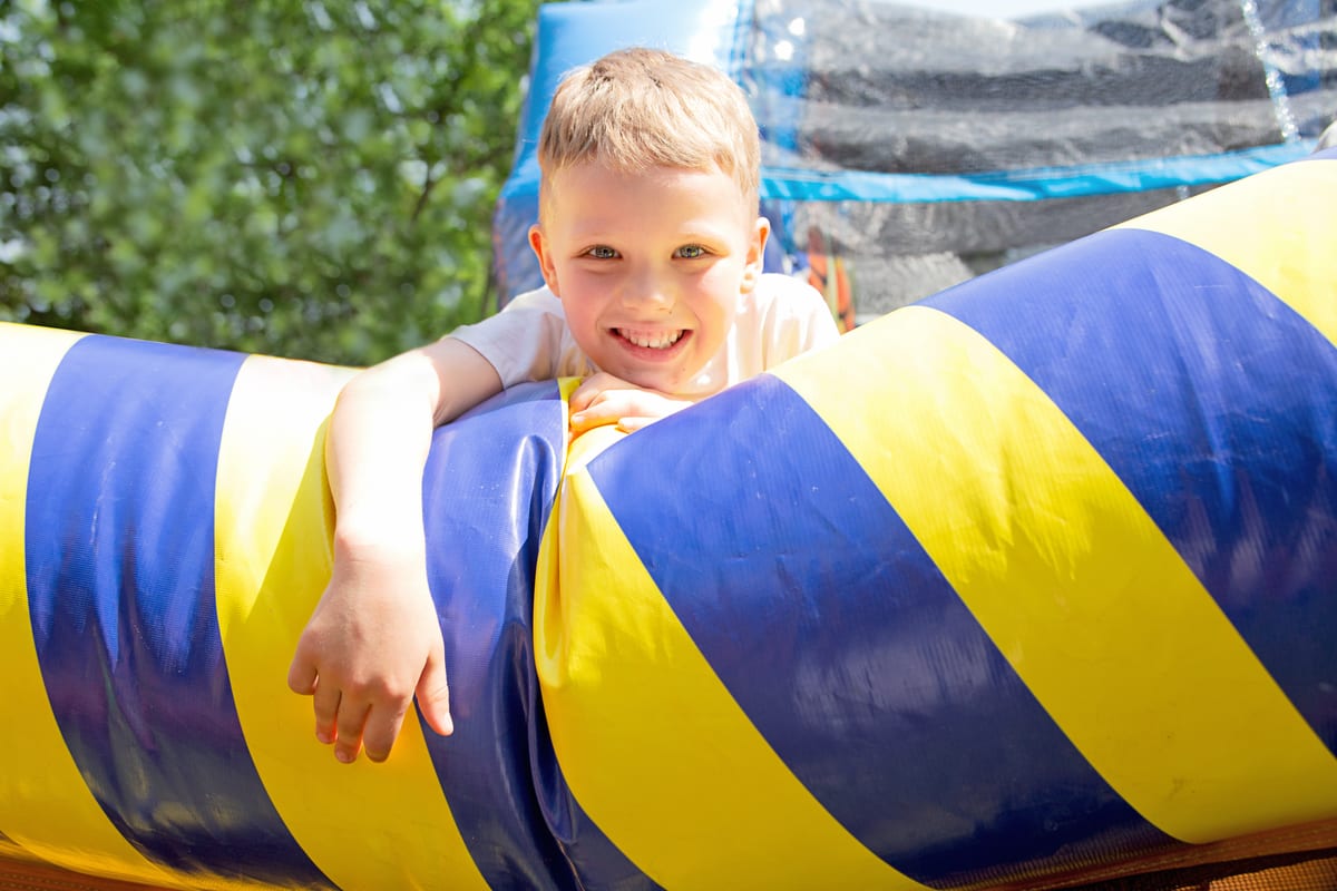 Jumping Castle hire — happy boy on the trampoline | Panda Party Hire Hire jumping castle — happy boy on the trampoline for parties and events in Johannesburg, Sandton and Randburg