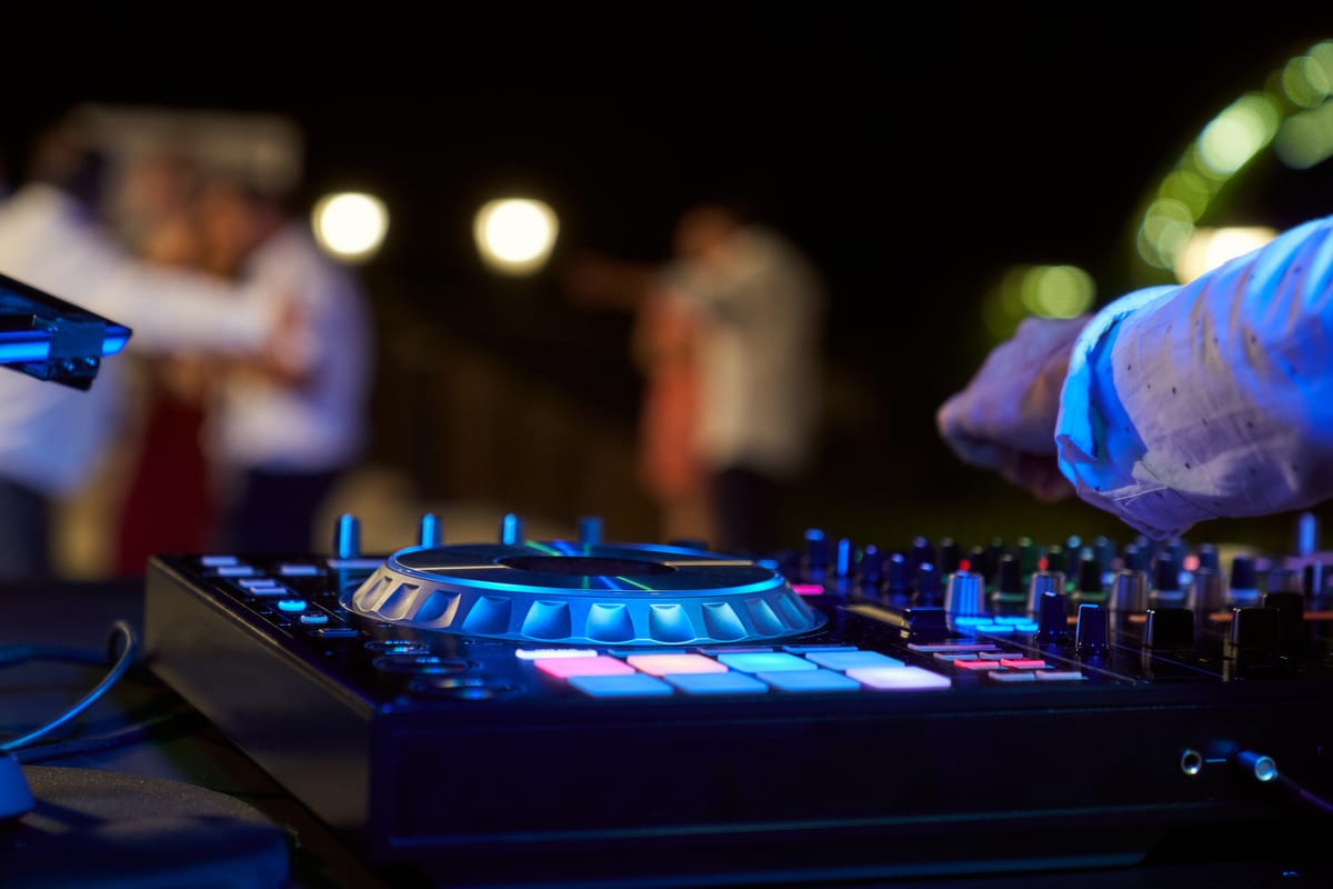 Sound System hire — dj equipment at nighttime event with dancing peopl | Panda Party Hire Hire sound system — dj equipment at nighttime event with dancing peopl for parties and events in Johannesburg, Sandton and Randburg